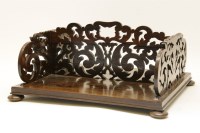 Lot 438 - A Victorian rosewood desk top book stand