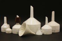 Lot 384 - Eight various pottery funnels