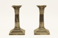 Lot 210 - A pair of dwarf silver candlesticks