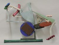 Lot 817 - A painted wall sculpture