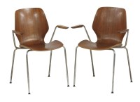 Lot 753 - A pair of laminated and chrome armchairs