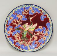 Lot 106 - A Longwy Pottery 'Bel Oiseau' charger