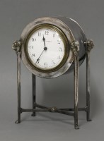 Lot 618 - A Mappin & Webb silver-plated drum mantel clock