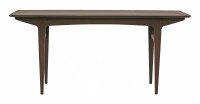 Lot 628 - A teak dining table