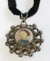 Lot 11 - An Arts and Crafts silver enamel pendant