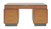 Lot 538 - An Art Deco walnut pedestal desk