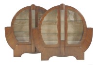 Lot 552 - A pair of Art Deco walnut display cabinets