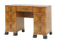 Lot 560 - An Art Deco walnut desk