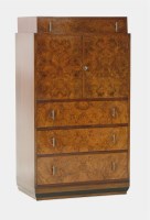 Lot 570 - An Art Deco walnut tallboy