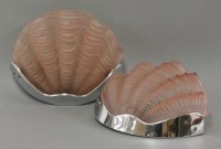 Lot 571 - A pair of pink tinted glass shell wall lights