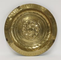 Lot 36 - A brass alms dish