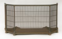 Lot 509 - A Regency brass and wire fender