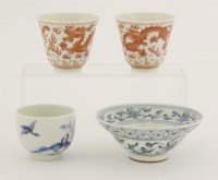Lot 95 - A pair of iron-red wine cups