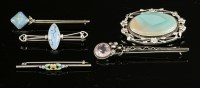 Lot 115 - A sterling silver and banded agate brooch