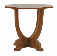 Lot 512 - An octagonal walnut lamp table
