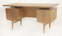 Lot 591 - A Danish teak desk