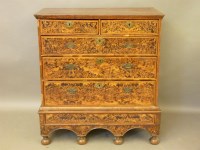 Lot 626 - A walnut and laburnum chest on stand