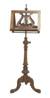 Lot 348 - A Victorian walnut music stand