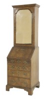 Lot 426 - A George I walnut bureau cabinet