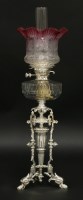 Lot 110 - An oil lamp