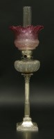 Lot 113 - An oil lamp