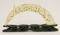 Lot 174 - A large warthog tusk carving