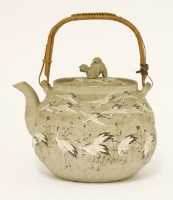 Lot 528 - A Japanese stoneware teapot
