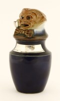 Lot 80 - A Royal Doulton stoneware tobacco jar and cover
