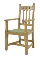 Lot 57 - An Arts and Crafts oak armchair