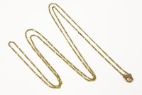 Lot 227 - A gold fetter and five link guard chain