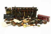 Lot 482 - A carved Black Forest pipe rack