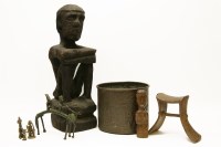 Lot 395 - A carved African headrest/pillow