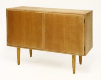 Lot 652 - A Danish light oak cupboard