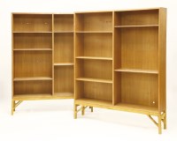 Lot 685 - A pair of Danish light oak bookcases