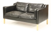 Lot 542 - A Danish leather two-seater settee