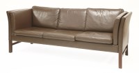 Lot 538 - A Danish brown leather three-seater settee