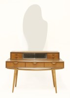Lot 295 - A teak dressing table