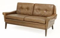 Lot 537 - A Danish brown leather two-seater settee