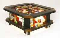 Lot 686 - An Italian ebonised and walnut illuminated coffee table