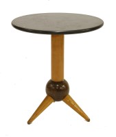Lot 266 - An ebonised and beech lamp table