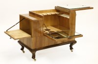 Lot 175 - A walnut drinks trolley