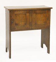 Lot 71 - An oak low cupboard