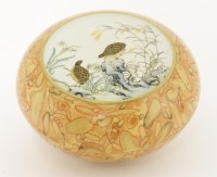 Lot 105 - A Chinese famille rose box and cover