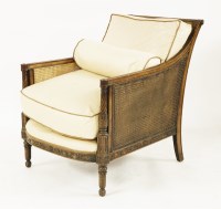 Lot 515 - A walnut bergère armchair