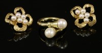Lot 262 - A two-stone cultured pearl crossover ring