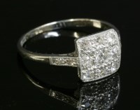 Lot 152 - An Art Deco diamond set square cluster ring