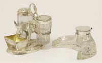 Lot 555 - A plated donkey cruet