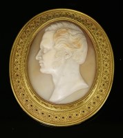 Lot 60 - An Archaeological Revival gold shell cameo brooch