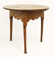 Lot 455 - An elm cricket table
