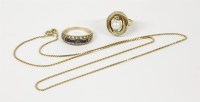 Lot 1 - A gold single stone cultured pearl ring flanked with diamonds